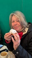 Becky enjoying her beignet at Cafe du Monde in NOLA