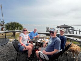 Enjoying pizza and beer at Eastpoint Brewery in Eastpoint, FL