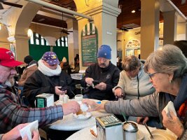 Fighting over beignets at Cafe du Monde in NOLA