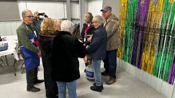 Trying to stay warm in the rally hall